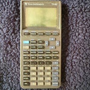 Texas Instruments TI-82 Graphing Calculator - Brown and Gray